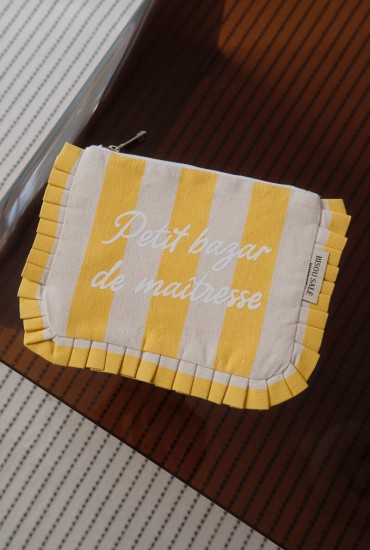 Pochette à volant rayée...